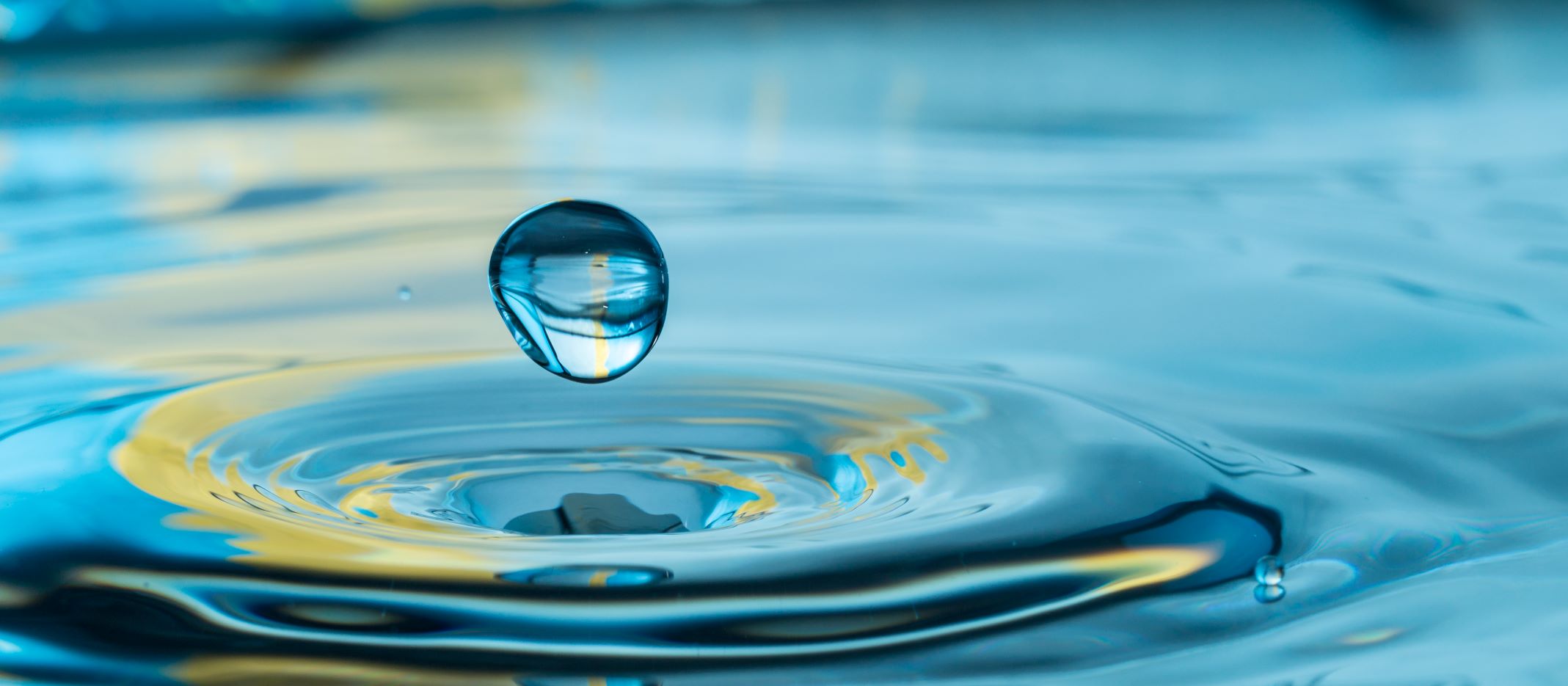water droplet splashing, rippling outward, mindfulness 